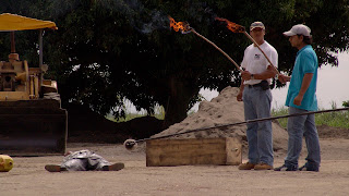 Directors holding a Stick