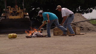 Director helping another to burn something